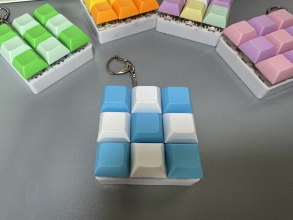 blue white 9 key keyboard keychain