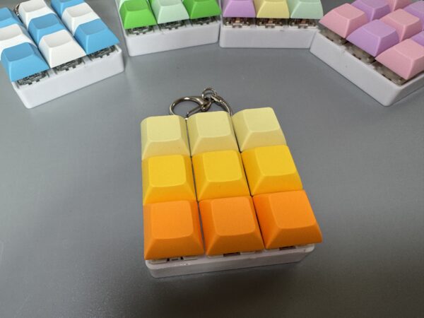 orange 9 key keyboard keychain