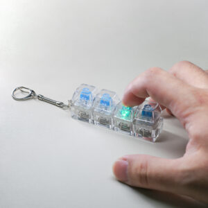 4 key keyboard fidget clicky with light